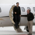 Former U.S. Marine Amir Hekmati, recently released from an Iranian prison, steps out of the plane piloted by Mike Karnowski, as he arrives at an airport in Flint